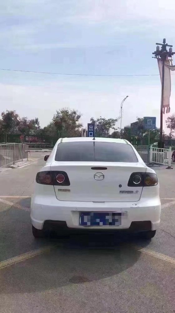 北京12年马自达32